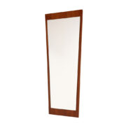 Trapezowe lustro na ścianę osadzone w ramie z płyty wiórowej w okleinie drewnopodobnej, Niemcy, lata 60