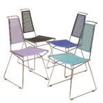 Komplet czterech krzeseł stołowych z siedziskami i oparciami z blachy perforowanej w czterech różnych kolorach osadzonymi na metalowych chromowanych rurkach, Rolf Rahmlow, Niemcy, lata 80.